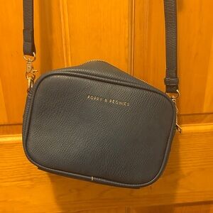 Poppy & Peonies Navy Pebbled Leather Crossbody purse.